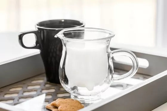 Stiklinis indelis pienui